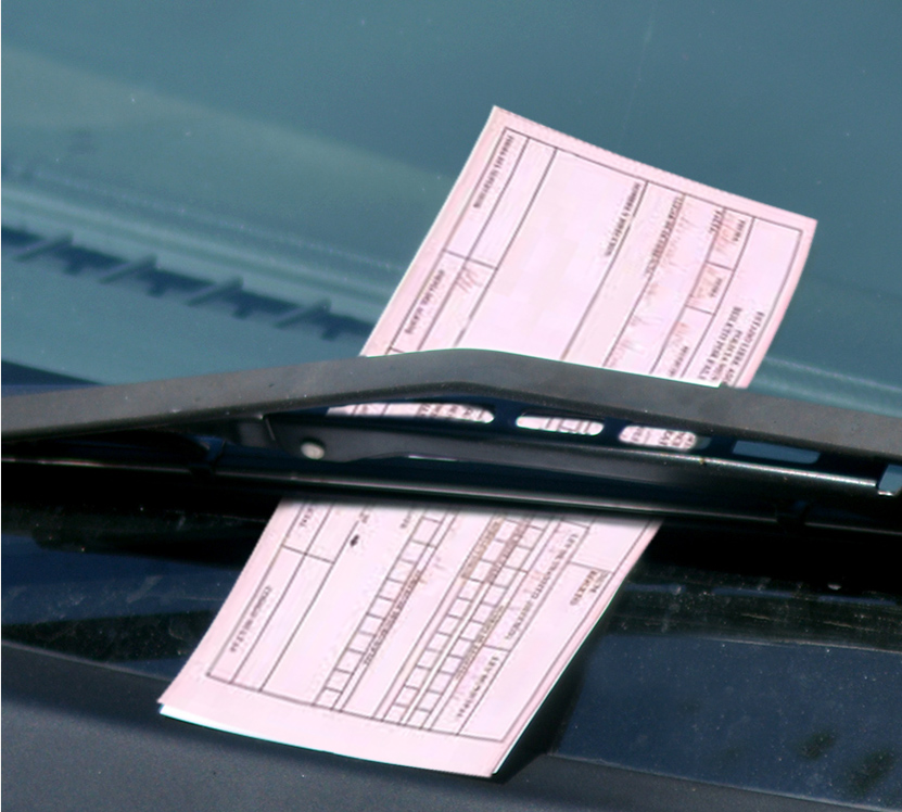 Windshield with a traffic ticket